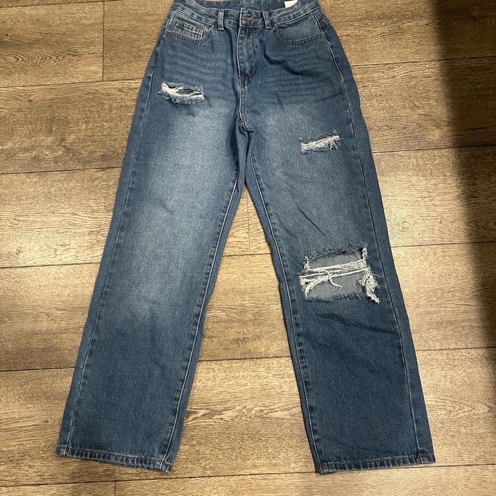 Distressed Blue Jeans